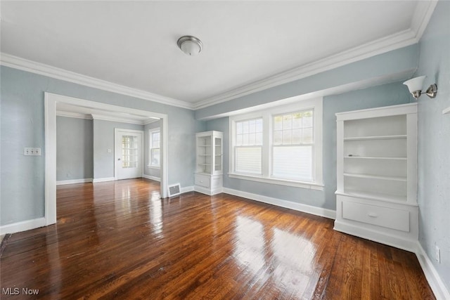 3331 Cedarbrook Rd, Cleveland Heights, OH 44118 - unfurnished living room featuring crown molding, wood finished floors, and baseboards