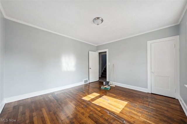 3331 Cedarbrook Rd, Cleveland Heights, OH 44118 - spare room with wood finished floors, baseboards, and ornamental molding