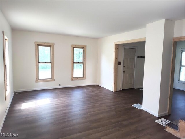 681 Madison St, Conneaut, OH 44030 - unfurnished room featuring dark wood finished floors and baseboards