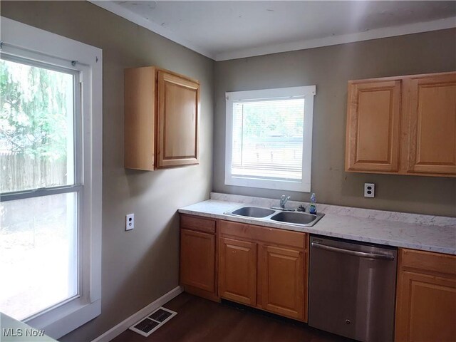 681 Madison St, Conneaut, OH 44030 - kitchen featuring dishwasher, a sink, light countertops, dark wood-style flooring, and baseboards