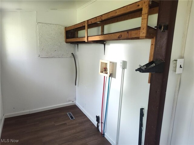 681 Madison St, Conneaut, OH 44030 - laundry area with hookup for a washing machine, dark wood finished floors, and baseboards