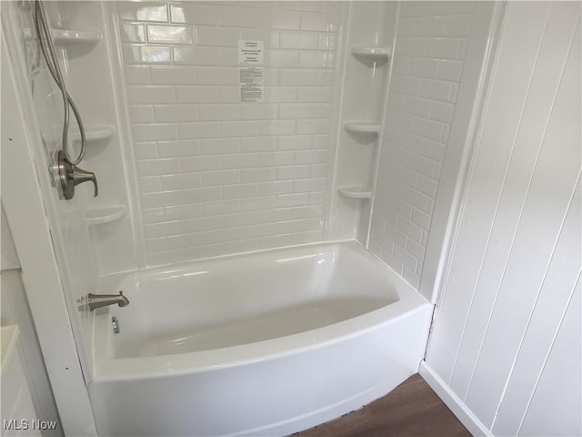 681 Madison St, Conneaut, OH 44030 - full bath featuring wood finished floors and shower / bath combination