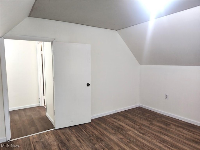 681 Madison St, Conneaut, OH 44030 - additional living space featuring lofted ceiling, wood finished floors, and baseboards