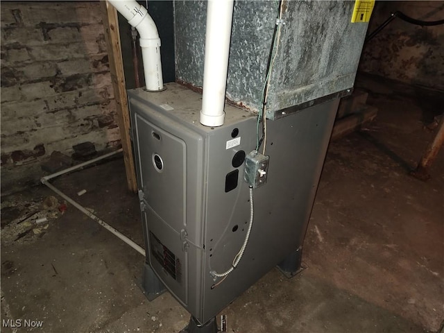 681 Madison St, Conneaut, OH 44030 - utility room with heating unit
