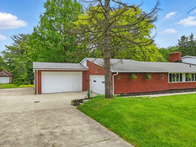 8049 Mccreary Rd, Broadview Heights, OH 44147 - view of front facade featuring concrete driveway, brick siding, a front yard, an attached garage, and roof with shingles