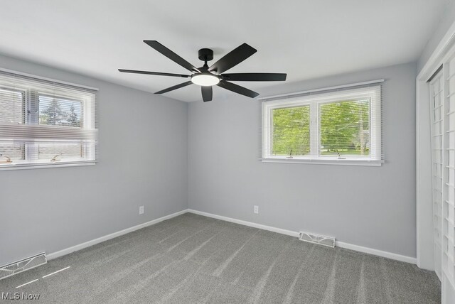 8049 Mccreary Rd, Broadview Heights, OH 44147 - unfurnished bedroom featuring carpet floors and a ceiling fan