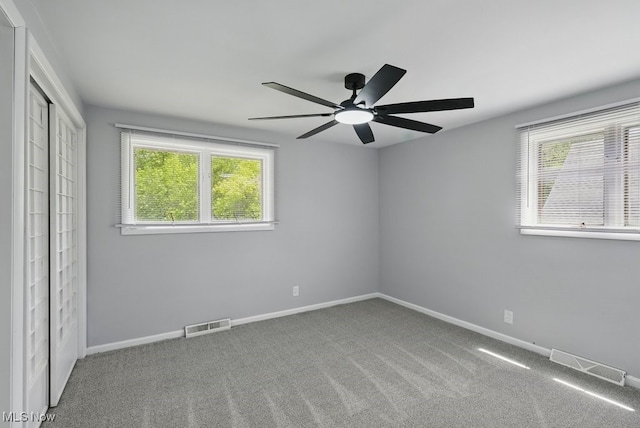 8049 Mccreary Rd, Broadview Heights, OH 44147 - unfurnished bedroom featuring carpet floors, baseboards, a closet, and ceiling fan