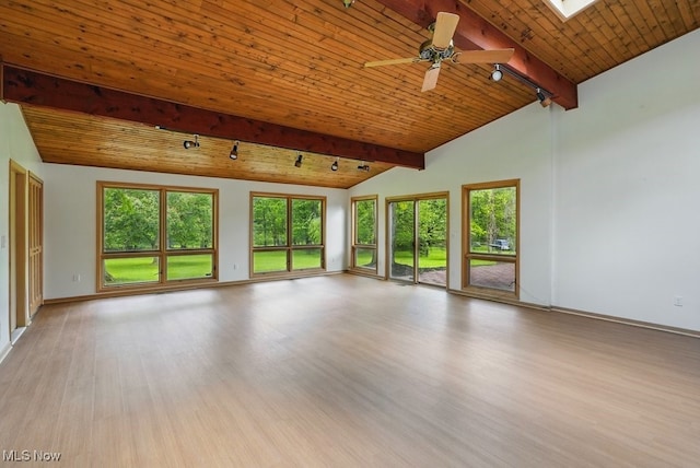 8049 Mccreary Rd, Broadview Heights, OH 44147 - unfurnished living room with light wood-style floors, wood ceiling, ceiling fan, baseboards, and a skylight