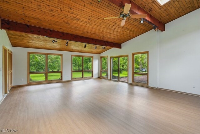 8049 Mccreary Rd, Broadview Heights, OH 44147 - unfurnished living room with light wood-style floors, wooden ceiling, a ceiling fan, a skylight, and track lighting