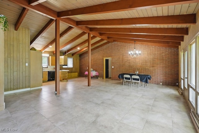 8049 Mccreary Rd, Broadview Heights, OH 44147 - bonus room featuring brick wall and a chandelier