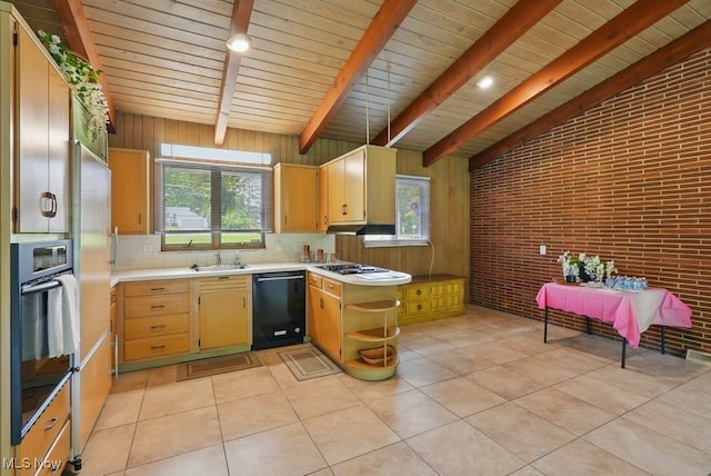 8049 Mccreary Rd, Broadview Heights, OH 44147 - kitchen featuring black dishwasher, oven, brick wall, a sink, and light countertops