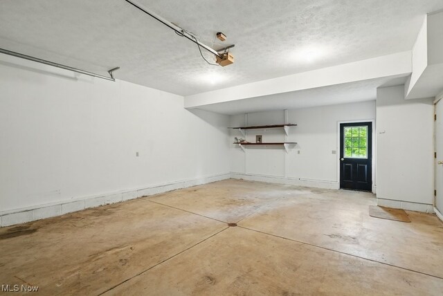 8049 Mccreary Rd, Broadview Heights, OH 44147 - garage with a garage door opener
