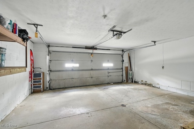 8049 Mccreary Rd, Broadview Heights, OH 44147 - garage featuring a garage door opener