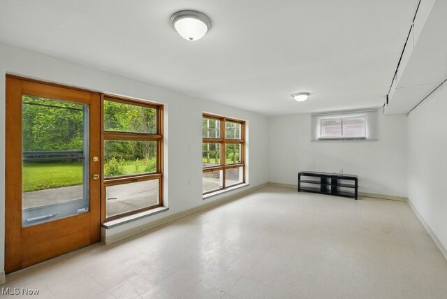 8049 Mccreary Rd, Broadview Heights, OH 44147 - empty room featuring healthy amount of natural light and baseboards