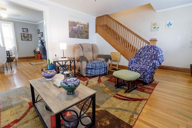 168 Brooklyn Ave, Salem, OH 44460 - living area featuring ornamental molding, wood finished floors, baseboards, stairway, and ceiling fan