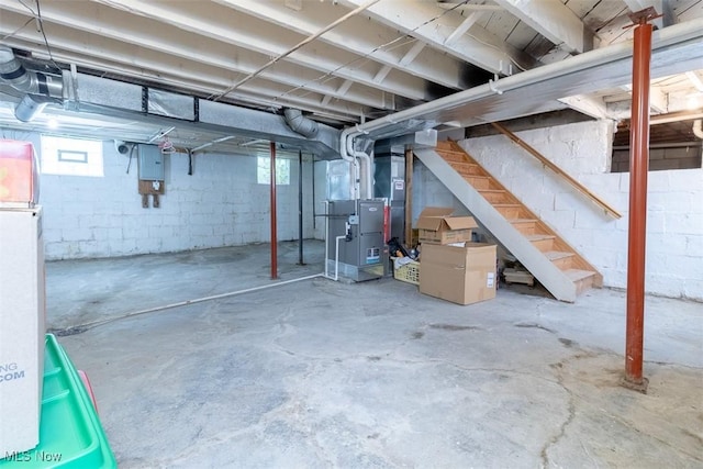 168 Brooklyn Ave, Salem, OH 44460 - basement with heating unit, stairs, and electric panel