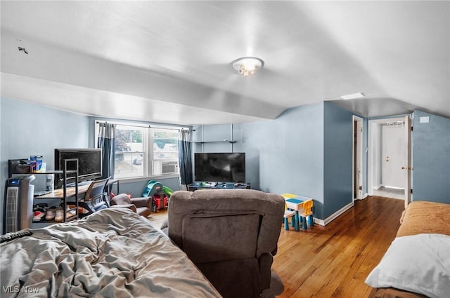 1572 S Belvoir Blvd, South Euclid, OH 44121 - bedroom with hardwood / wood-style flooring, baseboards, and lofted ceiling
