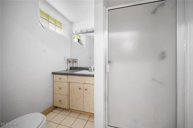 1572 S Belvoir Blvd, South Euclid, OH 44121 - full bath featuring a stall shower, toilet, vanity, and tile patterned flooring