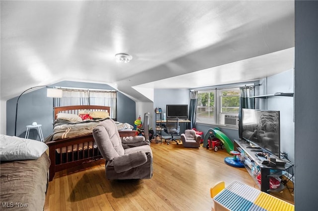 1572 S Belvoir Blvd, South Euclid, OH 44121 - bedroom with wood finished floors, lofted ceiling, and cooling unit