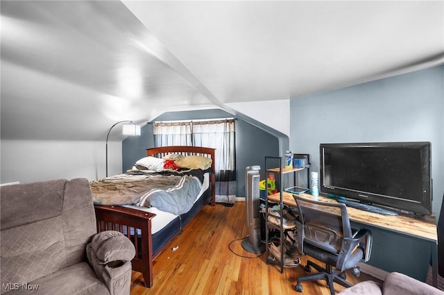 1572 S Belvoir Blvd, South Euclid, OH 44121 - bedroom featuring wood finished floors, a desk, baseboards, and vaulted ceiling