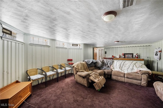 1572 S Belvoir Blvd, South Euclid, OH 44121 - carpeted living room featuring a textured ceiling