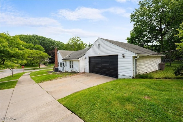 1572 S Belvoir Blvd, South Euclid, OH 44121 - view of front of house featuring driveway and a garage
