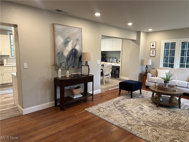 13707 Drexmore Rd, Shaker Heights, OH 44120 - living area with wood finished floors, recessed lighting, and baseboards