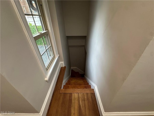 13707 Drexmore Rd, Shaker Heights, OH 44120 - staircase with wood finished floors and baseboards