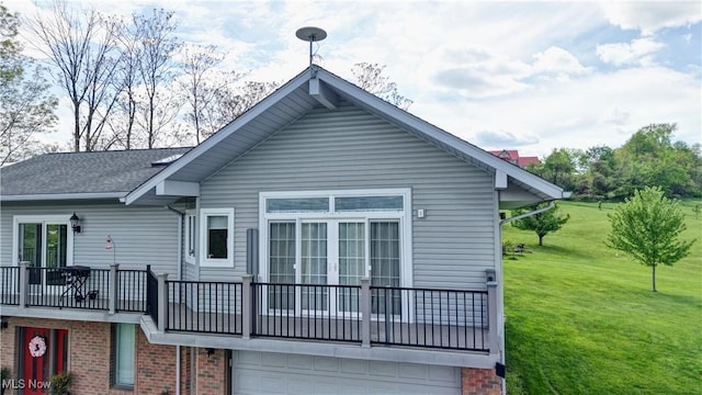 85530 Beagle Club Rd, Scio, OH 43988 - back of property featuring a balcony, a yard, a garage, and brick siding