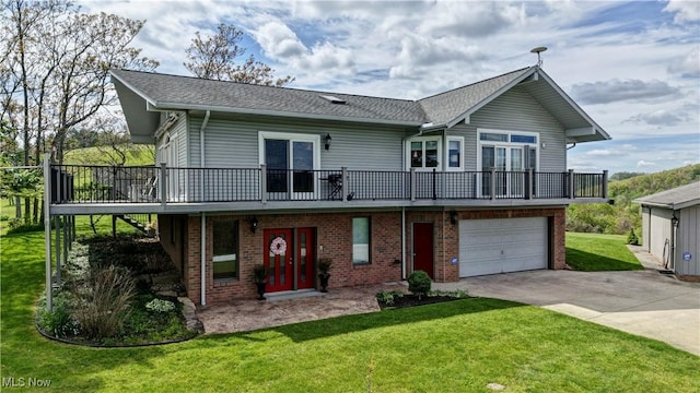 85530 Beagle Club Rd, Scio, OH 43988 - view of front of house featuring driveway, a front yard, a deck, brick siding, and an attached garage