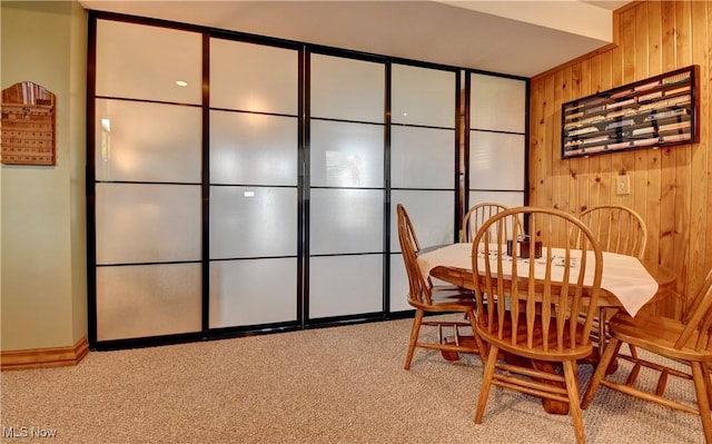 85530 Beagle Club Rd, Scio, OH 43988 - dining area with wooden walls and light carpet