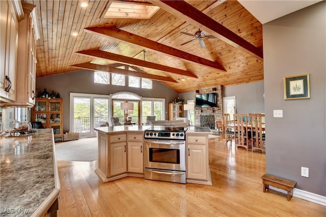 85530 Beagle Club Rd, Scio, OH 43988 - kitchen featuring electric stove, a fireplace, wood ceiling with exposed beams, light wood-style flooring, and open floor plan