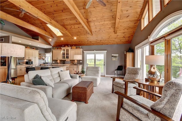 85530 Beagle Club Rd, Scio, OH 43988 - living area featuring wood ceiling with exposed beams, a ceiling fan, a skylight, light carpet, and recessed lighting