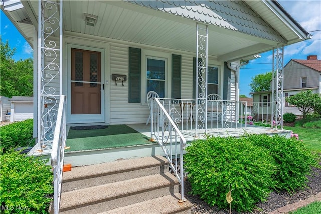 163 E Martin St, Amherst, OH 44001 - view of exterior entry featuring covered porch
