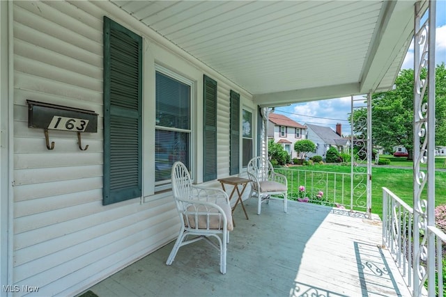 163 E Martin St, Amherst, OH 44001 - porch with a lawn