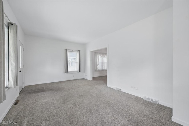 163 E Martin St, Amherst, OH 44001 - unfurnished room with carpet flooring and baseboards