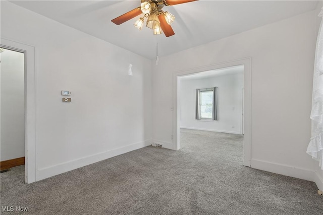 163 E Martin St, Amherst, OH 44001 - carpeted spare room with ceiling fan and baseboards
