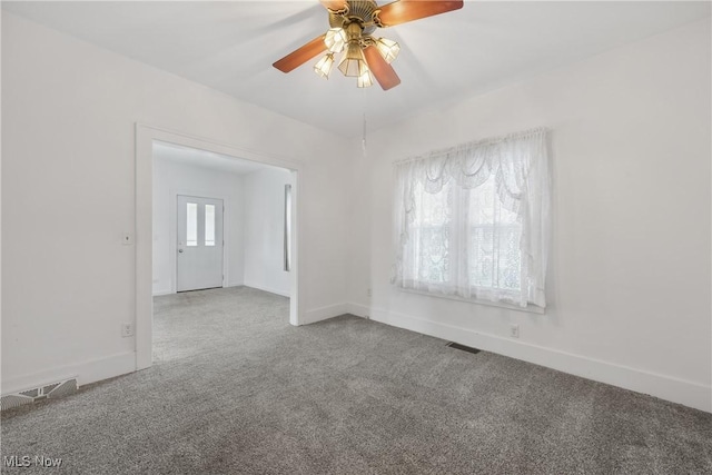 163 E Martin St, Amherst, OH 44001 - carpeted spare room featuring ceiling fan and baseboards