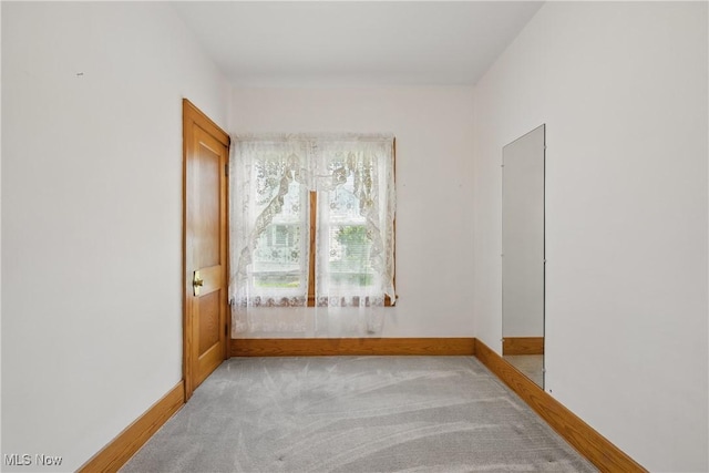 163 E Martin St, Amherst, OH 44001 - unfurnished room featuring carpet and baseboards