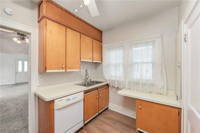 163 E Martin St, Amherst, OH 44001 - kitchen featuring white dishwasher, ceiling fan, a sink, and light countertops