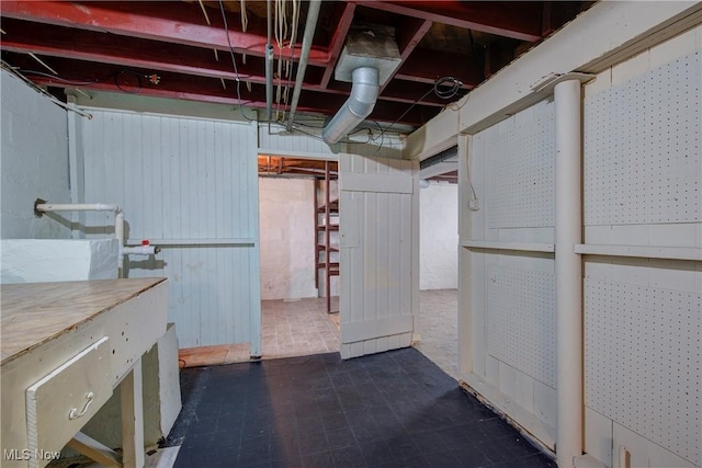 163 E Martin St, Amherst, OH 44001 - unfinished below grade area with tile patterned floors