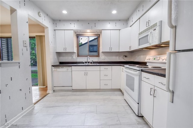 4473 Habersham Ln S, Richmond Heights, OH 44143 - kitchen with white appliances, a sink, dark countertops, white cabinets, and recessed lighting