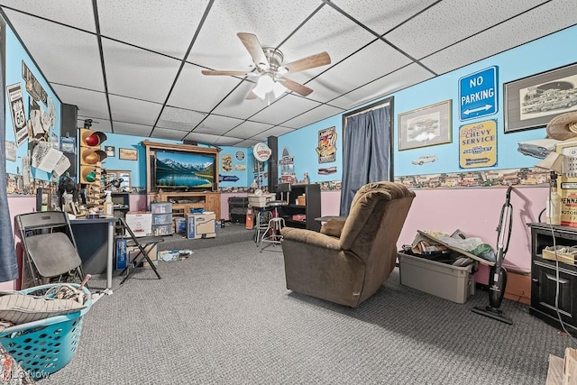 5869 Beechwood Ave, Alliance, OH 44601 - carpeted living area with a drop ceiling and ceiling fan