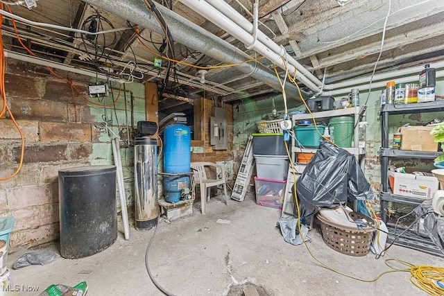 5869 Beechwood Ave, Alliance, OH 44601 - unfinished below grade area with electric panel, a water pressure tank, and concrete block wall