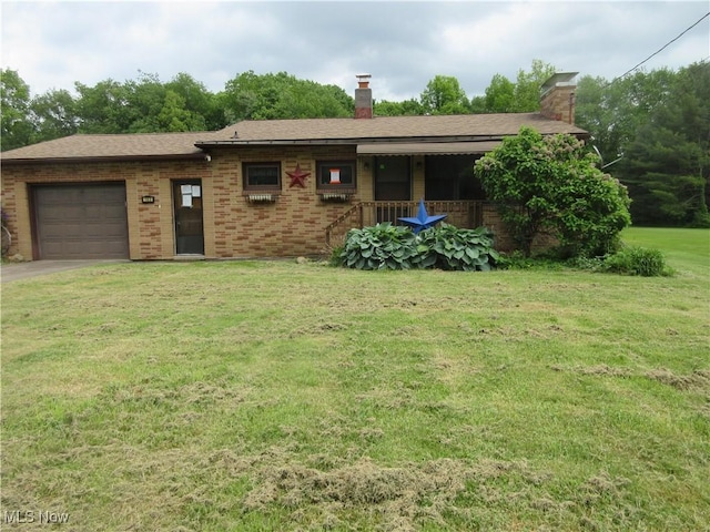 163 N Chestnut St, Linesville, PA 16424 - ranch-style home with a chimney, a garage, a front lawn, brick siding, and covered porch
