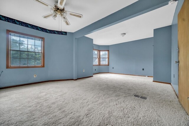 1586 E 86th St, Cleveland, OH 44106 - carpeted empty room with ceiling fan and baseboards