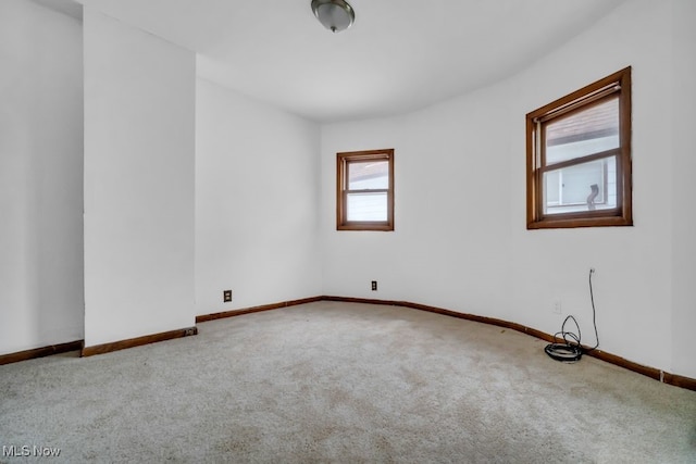 1586 E 86th St, Cleveland, OH 44106 - empty room with carpet flooring and baseboards