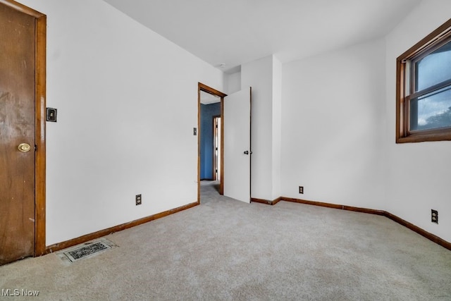1586 E 86th St, Cleveland, OH 44106 - unfurnished bedroom with carpet flooring and baseboards