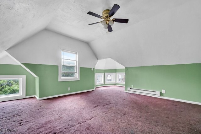 1586 E 86th St, Cleveland, OH 44106 - bonus room with baseboard heating, vaulted ceiling, carpet floors, baseboards, and ceiling fan