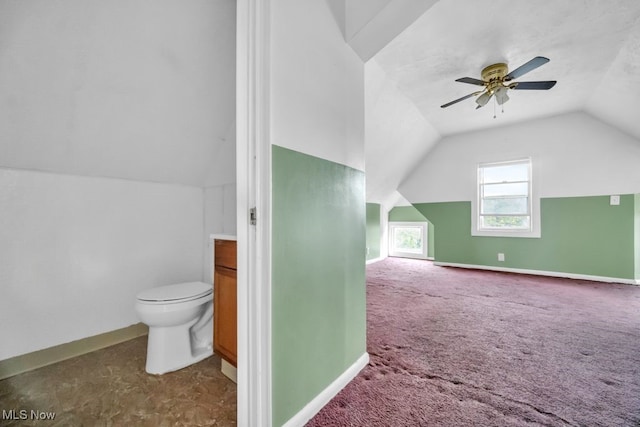 1586 E 86th St, Cleveland, OH 44106 - bonus room with lofted ceiling, a ceiling fan, baseboards, and carpet
